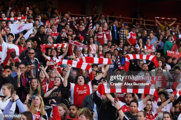 Fans show their support during the UEFA Women's Champions League semifinal 2nd leg match between Arsenal and VfL Wolfsburg at Emirates Stadium on May...
