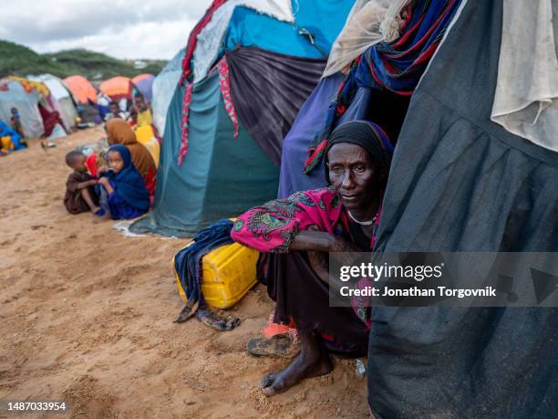Families, mainly women and children at Kahda IDP camp near Mogadishu. Most young kids arrive with severe malnutrition, and some die. June 20, 2022 in...