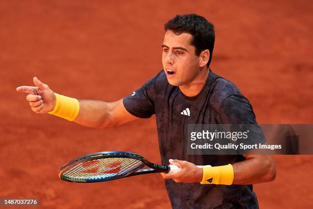 Jaume Munar of Spain argues with referee against Daniel Altmaier of Germany during their fourth round match on day nine of the Mutua Madrid Open at...