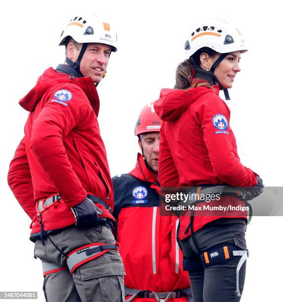 Prince William, Prince of Wales and Catherine, Princess of Wales take part in a Central Beacons Mountain Rescue Team abseiling training exercise on...