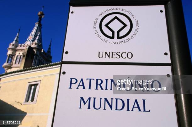 unesco world heritage sign with the tower of camara municipal (town hall) in the background. - town hall logo stock pictures, royalty-free photos & images