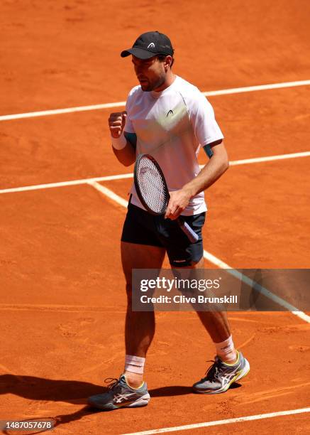 Aslan Karatsev celebrates match point against Daniil Medvedev in the Men's Singles Fourth Round match on Day Nine of the Mutua Madrid Open at La Caja...