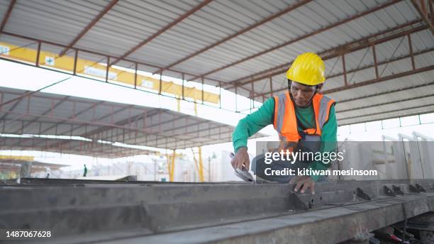 male construction workers are create a blog for make for precast wall in factory. laborers have skill and expertise in construction , working on a construction site at housing estate project. worker work in real estate. - mason bricklayer stock pictures, royalty-free photos & images