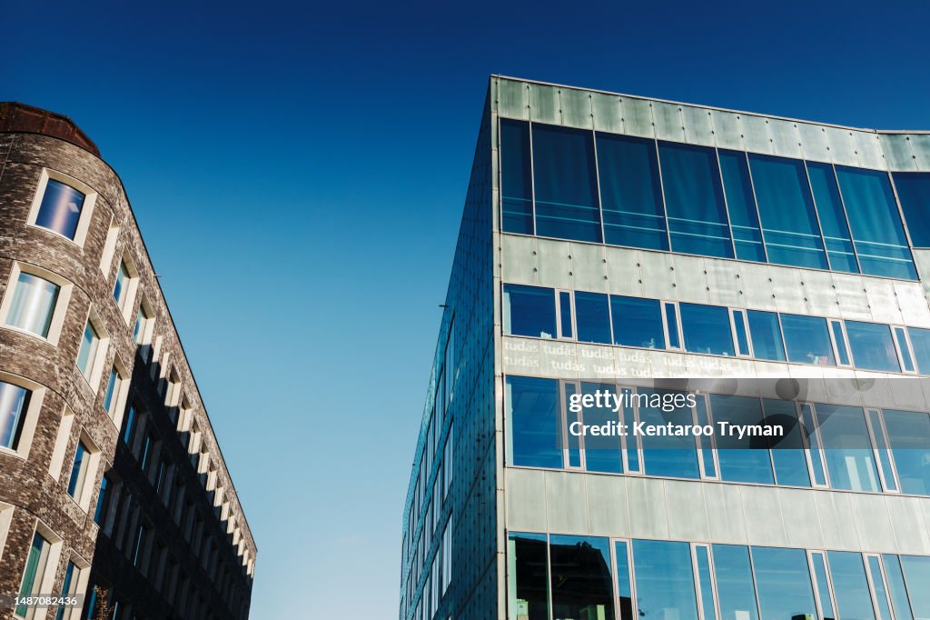 A multi-storey building with blue sky in the background.