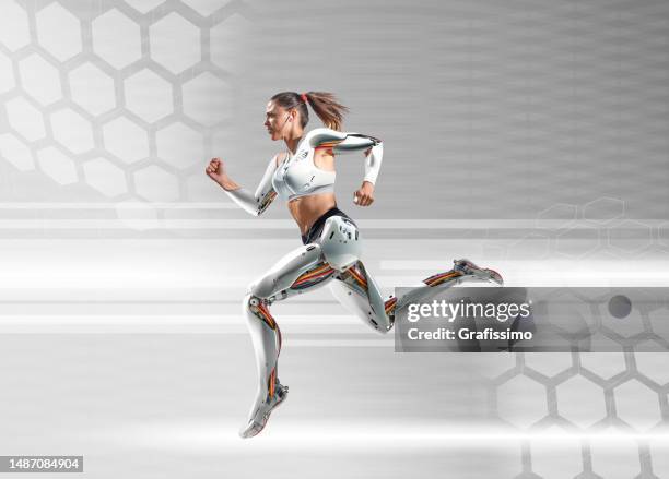 weiblicher cyborg mit bionischen beinen, der auf technischem hintergrund läuft - cyborg stock-fotos und bilder