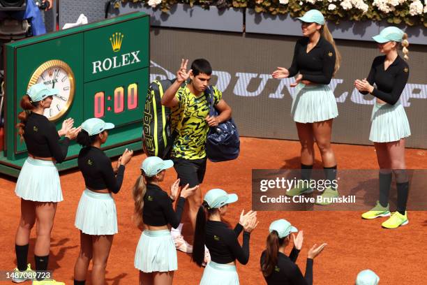 Carlos Alcaraz of Spain walks out onto the court prior to the Fourth Round match on Day Nine of the Mutua Madrid Open at La Caja Magica on May 02,...