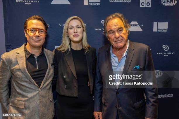 Ryan Lizza, Olivia Nuzzi and Oliver Stone attends the screening of "Nuclear Now" at Arleigh and Roberta Burke Theater on May 01, 2023 in Washington,...