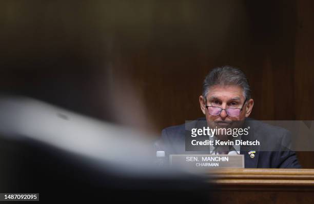 Sen. Joe Manchin , Chairman of the Senate Energy and Natural Resources Committee, questions Interior Secretary Deb Haaland during a hearing on May...