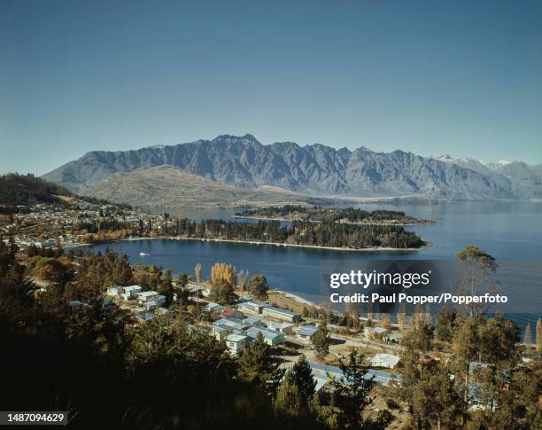 The resort town of Queenstown on the northern side of Lake Wakatipu in the Otago region of the South Island of New Zealand in 1965. Visible in...