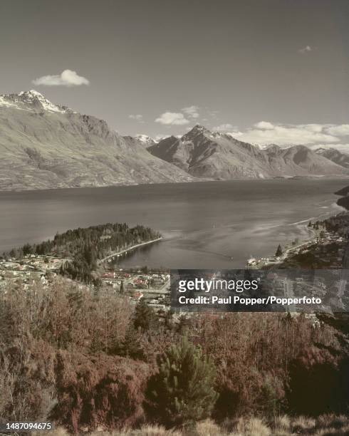 View of the resort town of Queenstown on the northern side of Lake Wakatipu in the Otago region of the South Island of New Zealand in 1965. Visible...