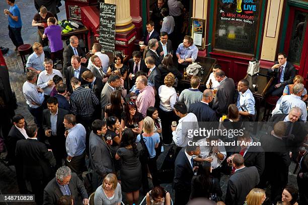 people at lamb tavern in leadenhall market. - crowded bar stock pictures, royalty-free photos & images