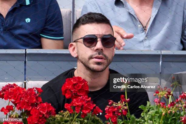 Youtuber DjMaRiiO attends the match between Carlos Alcaraz of Spain and Alexander Zverev of Germany on Day Nine of the Mutua Madrid Open at the La...