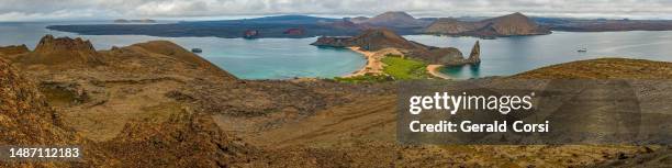 bartolome island, the pinnacle rock and the sulivan bay lava flow on james island. galapagos islands, ecuador. - isla san salvador stock pictures, royalty-free photos & images