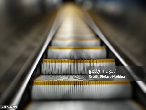 uphill subway escalator - budapest metro stock pictures, royalty-free photos & images