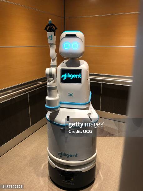 Moxi delivery focused robotic assistant in training, 4 foot tall robot that ferries medication, supplies, lab samples, and personal items through the...