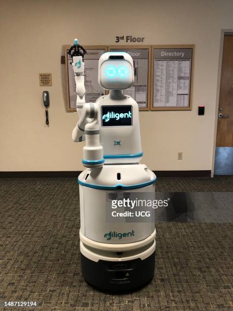 Moxi delivery focused robotic assistant in training, 4 foot tall robot that ferries medication, supplies, lab samples, and personal items through the...