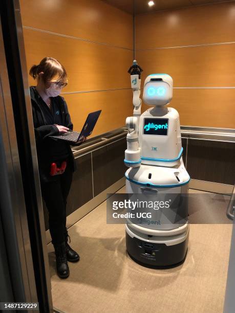 Moxi delivery focused robotic assistant in training, 4 foot tall robot that ferries medication, supplies, lab samples, and personal items through the...