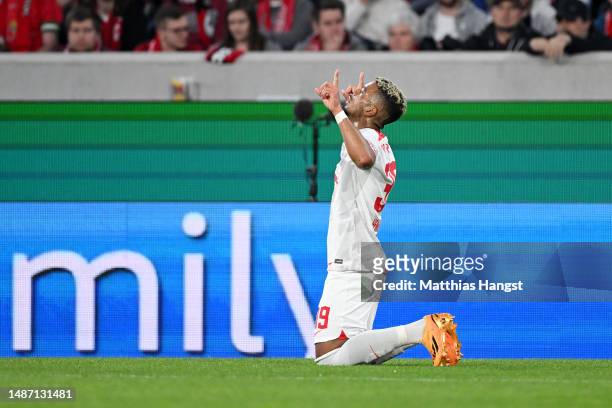 Benjamin Henrichs of RB Leipzig celebrates after scoring the team's second goal during the DFB Cup semifinal match between Sport-Club Freiburg and RB...