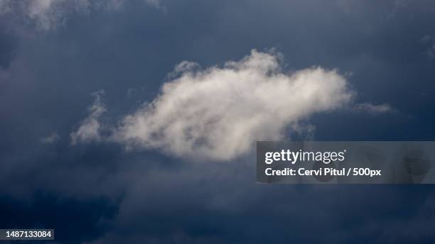 low angle view of clouds in sky,romania - stratocumulus stock pictures, royalty-free photos & images