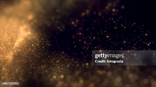 golden blurred particles background with copy space - christmas background copy space stock pictures, royalty-free photos & images