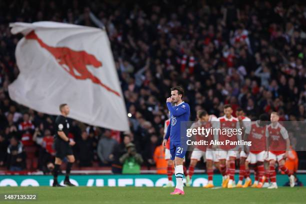 Ben Chilwell of Chelsea looks dejected after Martin Odegaard of Arsenal scores the team's first goal during the Premier League match between Arsenal...