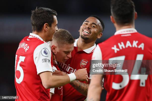 Gabriel Jesus of Arsenal celebrates after scoring the team's third goal with teammates Jakub Kiwior and Oleksandr Zinchenko during the Premier League...