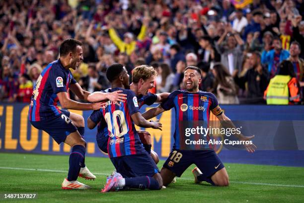 Jordi Alba of FC Barcelona celebrates with his teammates Eric Garcia, Ansu Fati and Frenkie De Jong after scoring their team's first goal during the...
