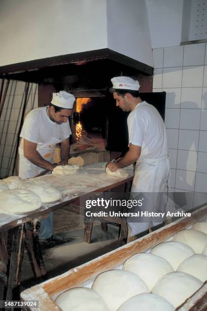 Matera. Two Men Prepare Bread In Cifarelli Bakery.