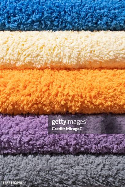 colorful fluffy towels in stack - microfiber stock pictures, royalty-free photos & images
