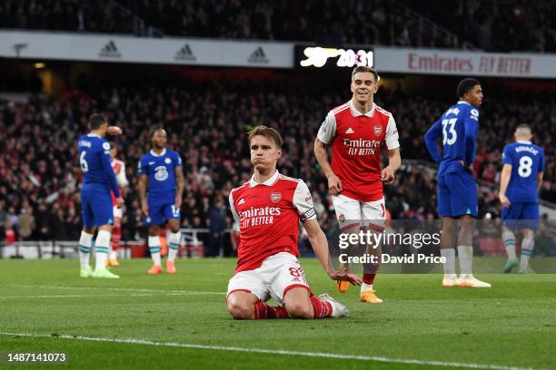 Martin Odegaard of Arsenal celebrates after scoring the team's second goal during the Premier League match between Arsenal FC and Chelsea FC at...