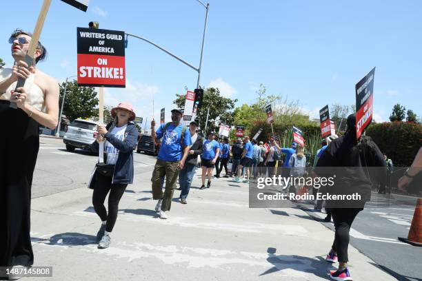 Jacob Tobia, Frances Fisher and members of the Writers Guild of America and its supporters picket outside of CBS Television City on May 02, 2023 in...