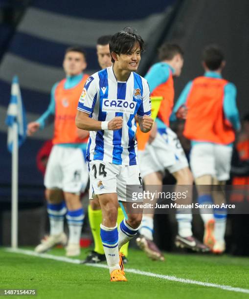 Takefusa Kubo of Real Sociedad celebrates after scoring the team's first goal during the LaLiga Santander match between Real Sociedad and Real Madrid...