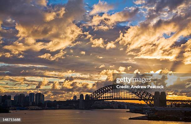 sunrise over sydney harbour bridge. - sydney dawn stock pictures, royalty-free photos & images