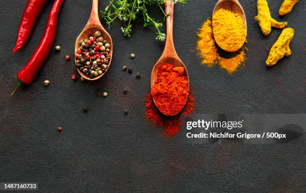 various spices spoons on stone table top view with copy space,romania - spices stock pictures, royalty-free photos & images