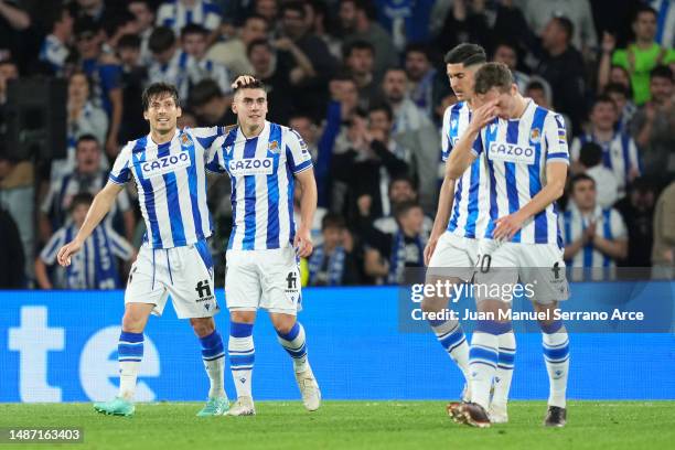 Ander Barrenetxea of Real Sociedad celebrates with teammate David Silva after scoring the team's second goal during the LaLiga Santander match...