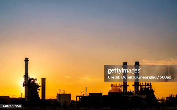 gas turbine electrical power plant energy for support factory in industrial estate natural gas tank small gas power plant power plant using natural gas for fuel green energy dramatic sunset sky,romania - gas turbine electrical power plant stock pictures, royalty-free photos & images