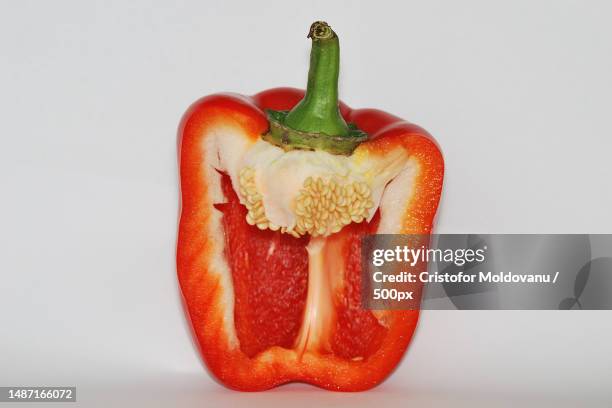 close-up of tomato against white background,romania - half complete stock pictures, royalty-free photos & images