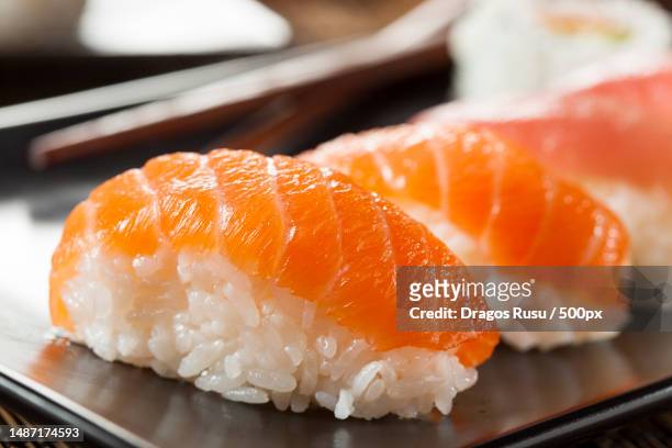 healthy japanese nigiri sushi with rice and fish,romania - nigiri fotografías e imágenes de stock