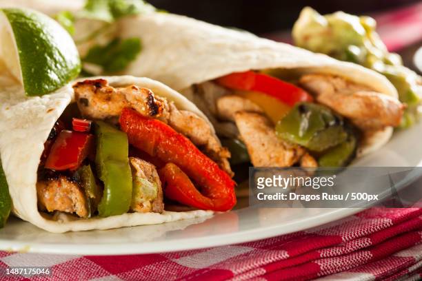 homemade chicken fajitas with vegetables and tortillas,romania - shawarma stock-fotos und bilder