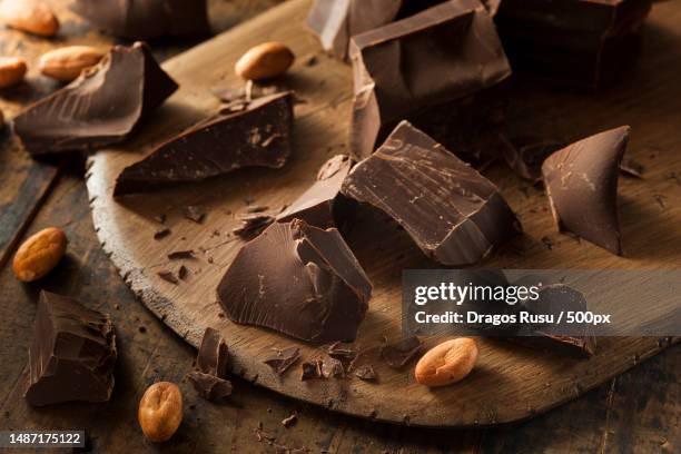 organic dark chocolate chunks ready for baking,romania - eating dark chocolate stock pictures, royalty-free photos & images