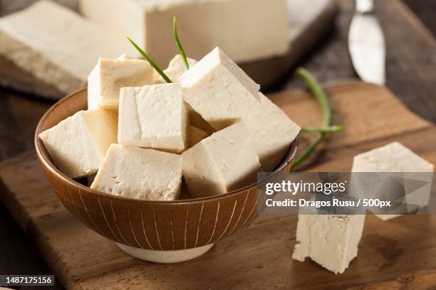 organic raw soy tofu on a background,romania - tofu stock-fotos und bilder