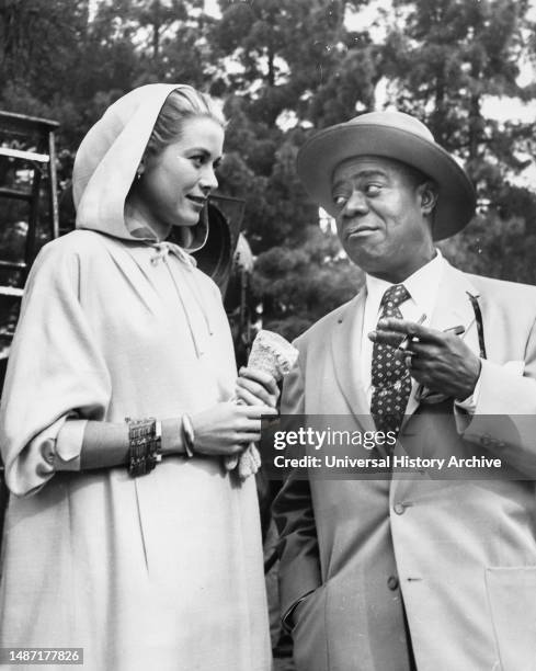 Grace kelly and louis armstrong, hollywood 1956.