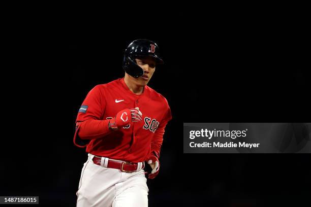 Masataka Yoshida of the Boston Red Sox rounds the bases after hitting a home run against the Toronto Blue Jays during the fourth inning at Fenway...