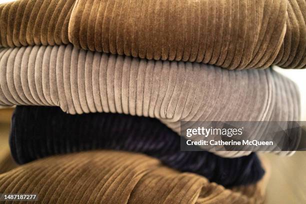 stack of corduroy pants - corduroy stockfoto's en -beelden