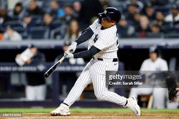 Willie Calhoun of the New York Yankees hits a solo home run during the seventh inning against the Cleveland Guardians at Yankee Stadium on May 02,...