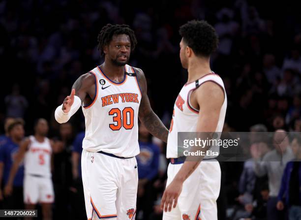 Julius Randle and Quentin Grimes of the New York Knicks celebrate late in the game against the Miami Heat during game two of the Eastern Conference...