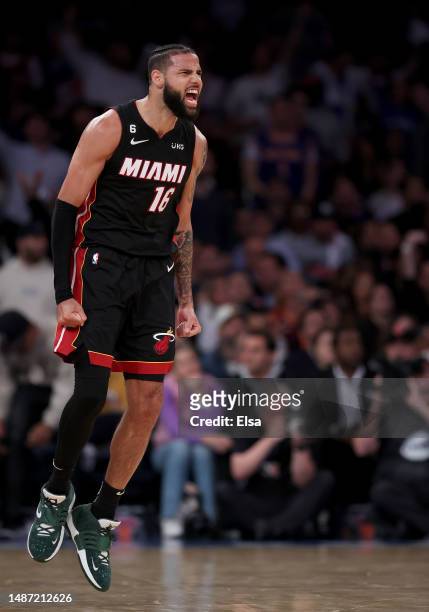 Caleb Martin of the Miami Heat celebrates his three point shot in the second half against the New York Knicks during game two of the Eastern...