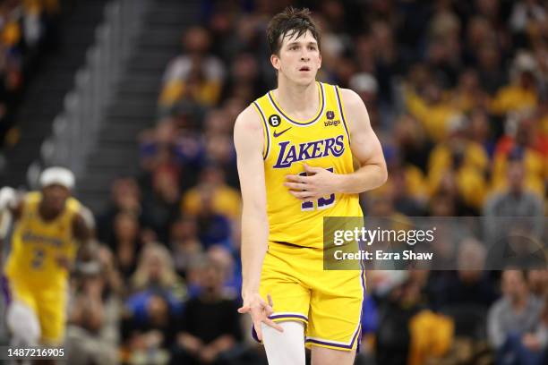 Austin Reaves of the Los Angeles Lakers celebrates after a three point basket during the third quarter in game one of the Western Conference...