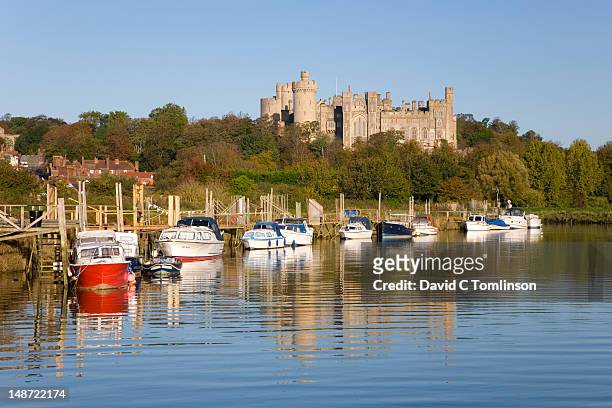 river arun and boats at their moorings with the castle in background. - sussex stock pictures, royalty-free photos & images