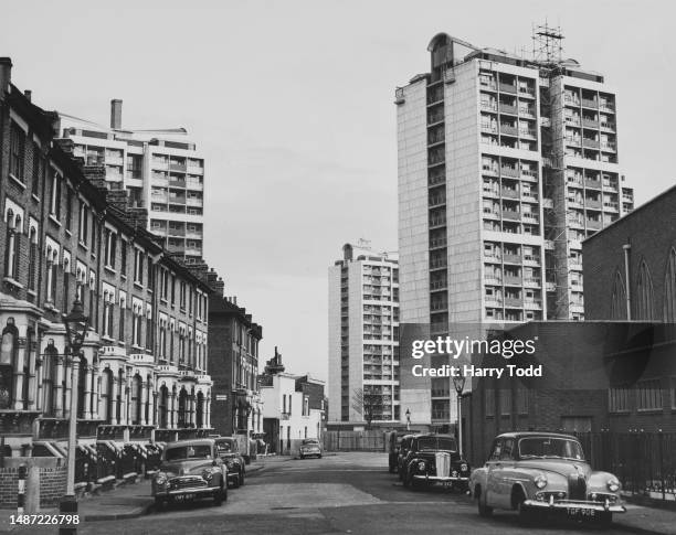 Three of the six 18-storey, 170-foot tower blocks of the Brandon Estate, rising above existing housing in Kennington in London, England, 27th October...